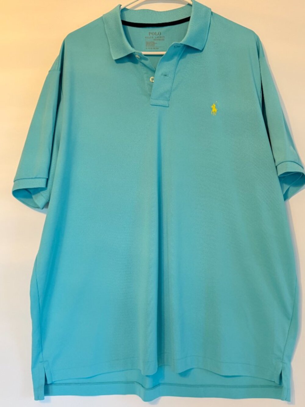 Polo Ralph Lauren Performance men's polo shirt in a vibrant aqua blue color with